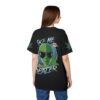 Green and blue graphics, including pot leaves, aliens, and UFOs, cover this black t-shirt.