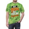 Green shamrocks and a playful kiss graphic cover this tee shirt, with bold text that reads 