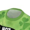 Vibrant green shamrocks with subtle texture cover this all over print apparel, featuring a playful St. Patrick's Day message.