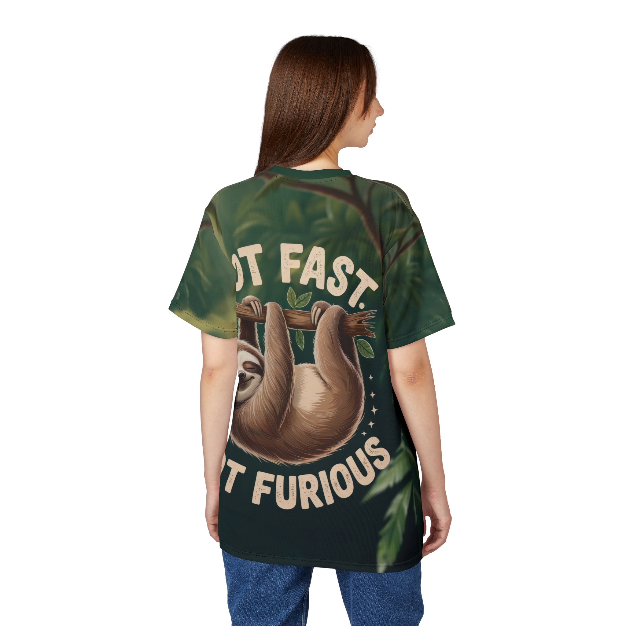 Dark green foliage and branches cover this graphic streetwear tee, featuring a sloth hanging upside down with the text "NOT FAST. NOT FURIOUS."
