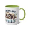 White ceramic mug with a green rim and handle, featuring a cute sloth illustration and text.