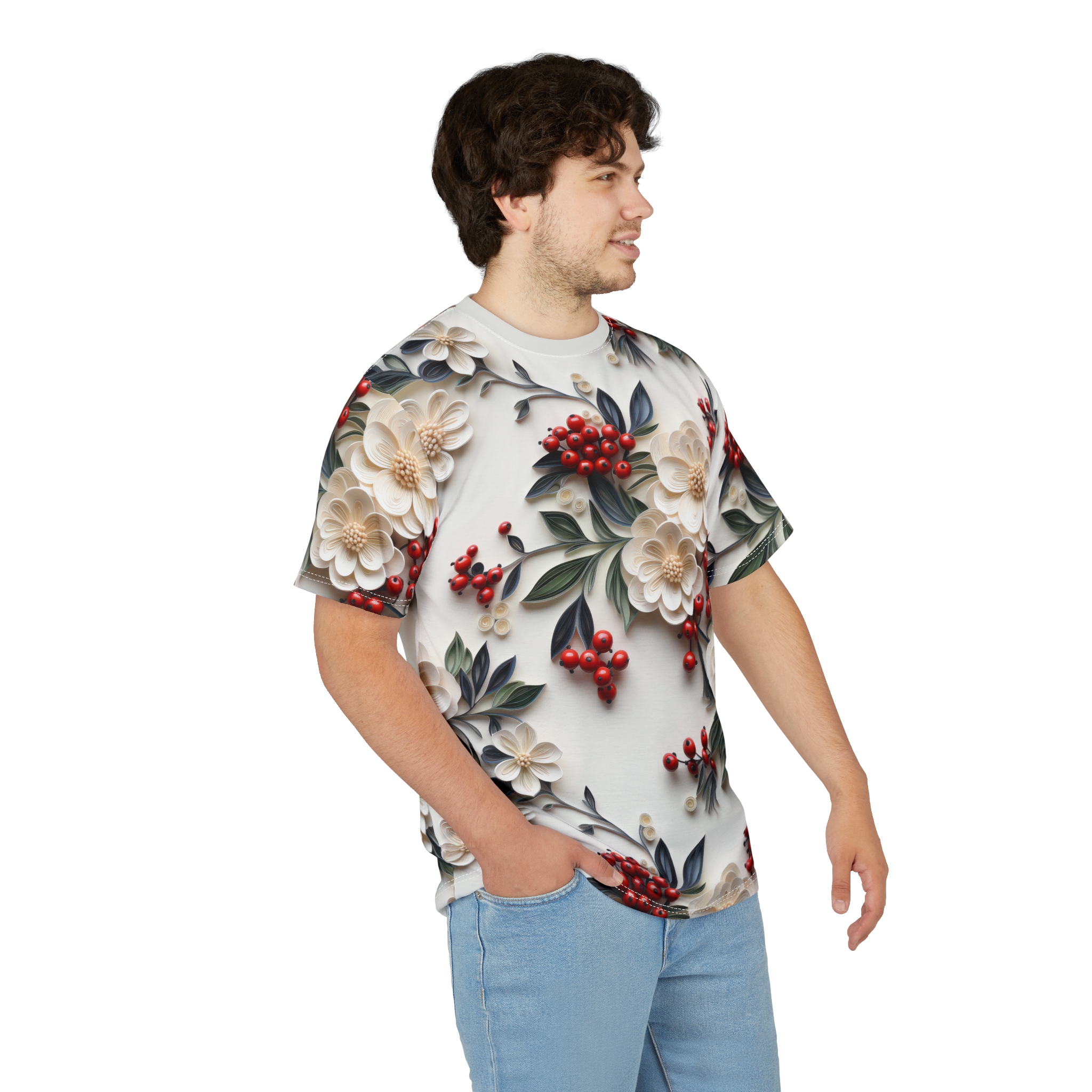 Creamy white flowers with detailed petals and red berries with green leaves cover this patterned tee shirt, creating a botanical design.
