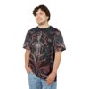 Dark foliage, pink flowers, and swirling vines cover this sublimation graphic tee, depicting a gothic skeleton with multiple eyes.