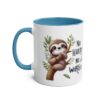 White ceramic mug with a bright blue handle and interior, featuring a cute sloth on a branch with 