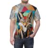 Geometric shapes in earthy tones and vibrant colors cover this seamless pattern tee, depicting a stylized wolf's face with sharp features.