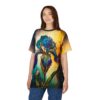 Vivid blues, purples, and yellows in a watercolor style cover this oversized full print tee, depicting a large iris flower and buds.