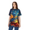 Blue, orange, and yellow cosmic elements cover this oversized full print tee, depicting a blue chihuahua with fiery wings and a golden collar on a fiery platform against a starry night sky.