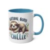 A white mug with a blue interior and handle, featuring a sleeping sloth illustration and the words 