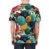 Vibrant pink, teal, yellow, and blue flowers with green leaves cover this all over print t-shirt, set against a textured white background.