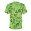 Shades of green shamrocks cover this sublimation graphic tee, with some appearing textured and others translucent.
