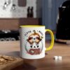 White ceramic mug with a yellow handle and rim, featuring a cute sloth peeking out of a pumpkin.