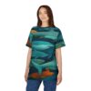 Teal, blue, and orange sharks swim in dark water across this oversized full print tee.