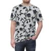 Black floral vines with textured petals cover this 3D graphic t-shirt on a white textured background.