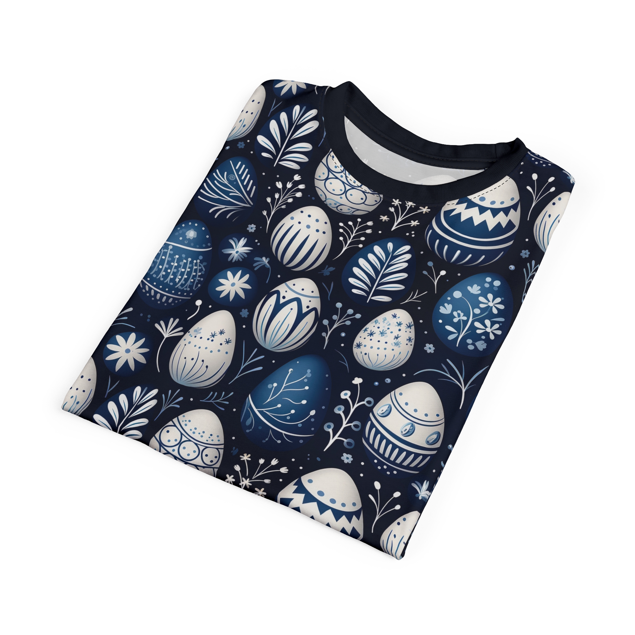 Blue and white floral patterns and decorative Easter eggs cover this all over print t-shirt, set against a dark navy background.