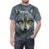 Grey and black watercolor textures cover this graphic streetwear tee, depicting a realistic wolf's face with intense yellow eyes.