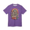 Purple tee with vintage-style graphics featuring a rainbow, smiley flowers, hearts, and the words