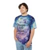 Deep blues, purples, and soft whites cover this sublimation graphic tee, depicting a whimsical night sky with a crescent moon, stars, and a perched owl.