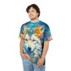 Vibrant blues and greens with floral patterns cover this oversized full print tee, featuring a mystical wolf adorned with a jeweled floral crown.