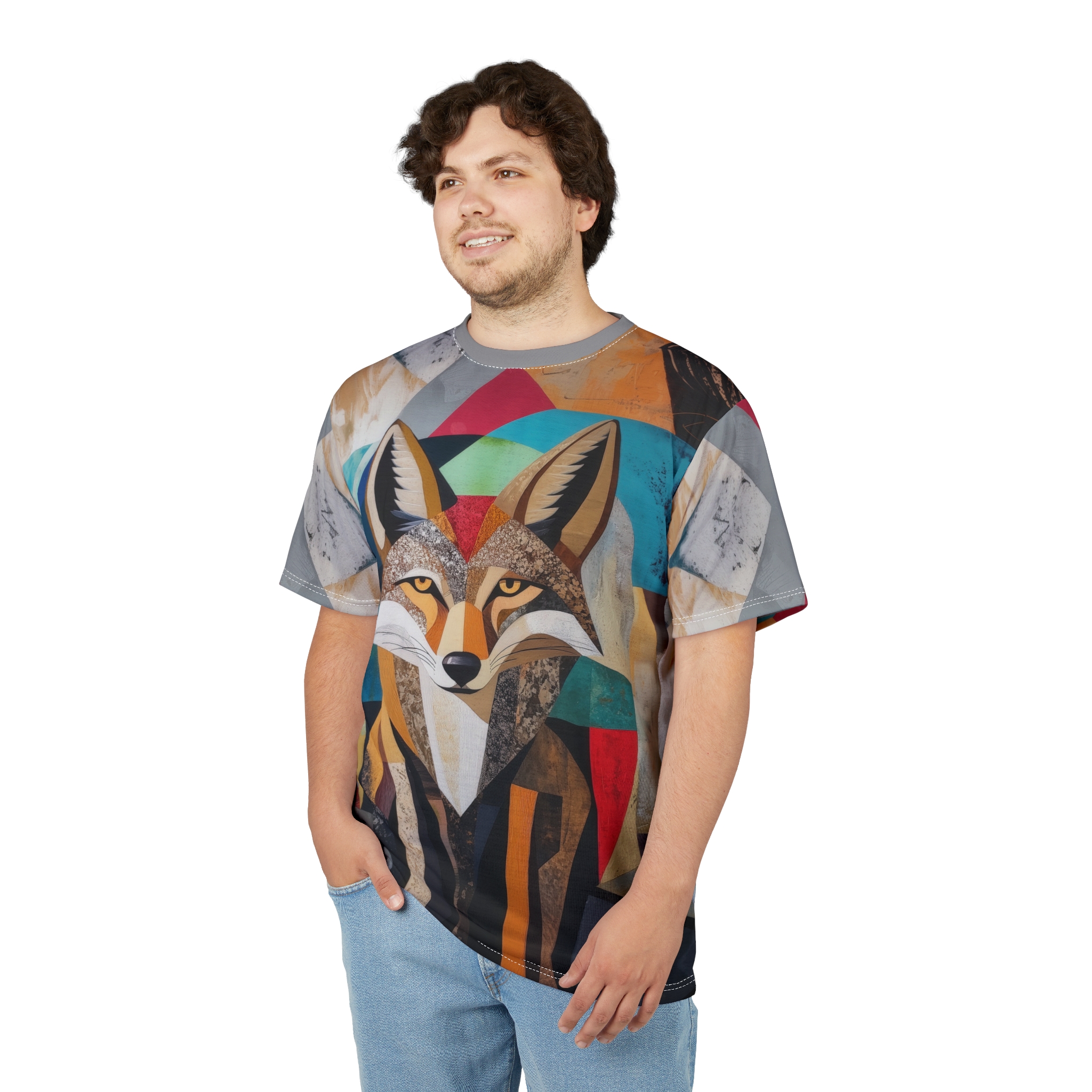 Geometric shapes in grey, orange, teal, and red cover this seamless pattern tee, with a wolf's face depicted in a collage-like animal print.