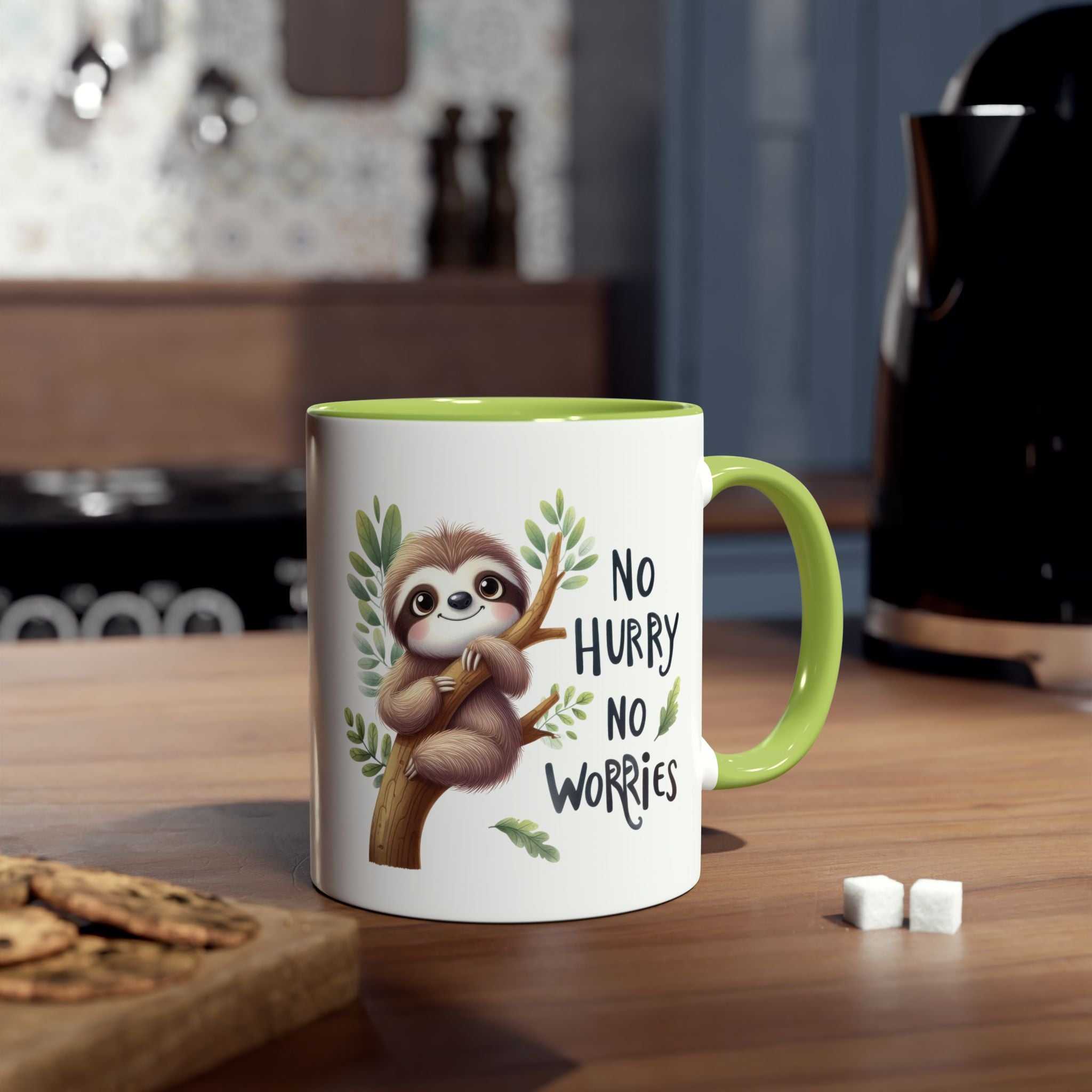 White ceramic mug with a lime green interior and handle, featuring a cute sloth illustration and the text "No Hurry No Worries."
