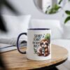White ceramic mug with a navy blue handle and rim, featuring a cute sloth illustration and text.