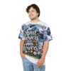 Watercolor blues and whites depict stormy clouds with rain, while vibrant tulips and daisies bloom below, spelling out