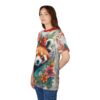 Red, orange, and purple florals with a detailed red panda face cover this t-shirt, set against a textured grey background.