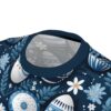 Blue and white floral patterns and Easter eggs in various blue and white hues cover this sublimation graphic tee, with a dark blue background and scattered white dots.