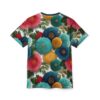 Red, teal, blue, and yellow textured floral designs with green leaves cover this all over print t-shirt, set against a textured white background.