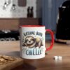 White ceramic mug with a red handle and rim, featuring a sloth illustration.
