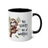 White ceramic mug with black handle and interior, featuring a cute sloth on a tree branch and the text