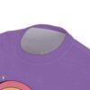 Purple with a distressed texture and subtle star accents, this seamless pattern tee features a vibrant rainbow arc.