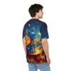 Deep blues and star patterns cover this graphic streetwear tee, featuring a blue chihuahua with fiery wings and a golden collar.
