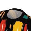 Bold red, orange, yellow, and teal brush strokes on a black background cover this full print shirt, with abstract shapes and textures.
