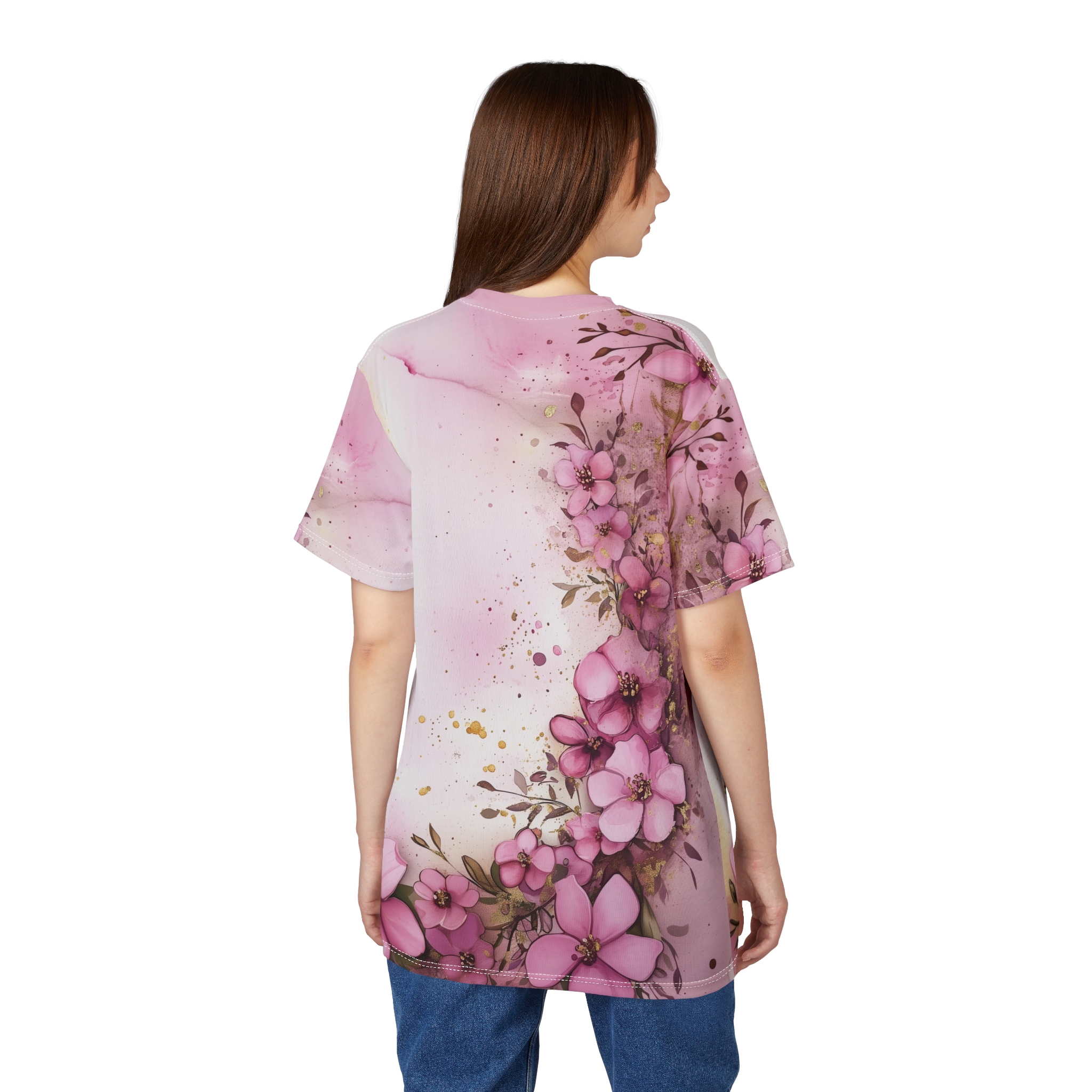 Pink watercolor washes and gold splatter cover this full print shirt, featuring a cascade of detailed pink blossoms and delicate foliage.