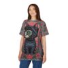 Red poppies and green leaves cover this sublimation graphic tee, depicting a black cat with a cubical head and emerald eyes.
