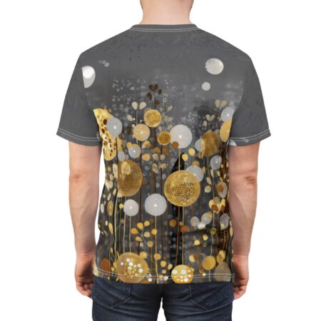 Golden and white textured orbs and abstract flora cover this sublimation graphic tee, set against a dark, painterly background with scattered dots.