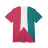 A t-shirt with an abstract design featuring vertical color blocks of magenta, white, and teal, with a triangular magenta shape at the bottom center.