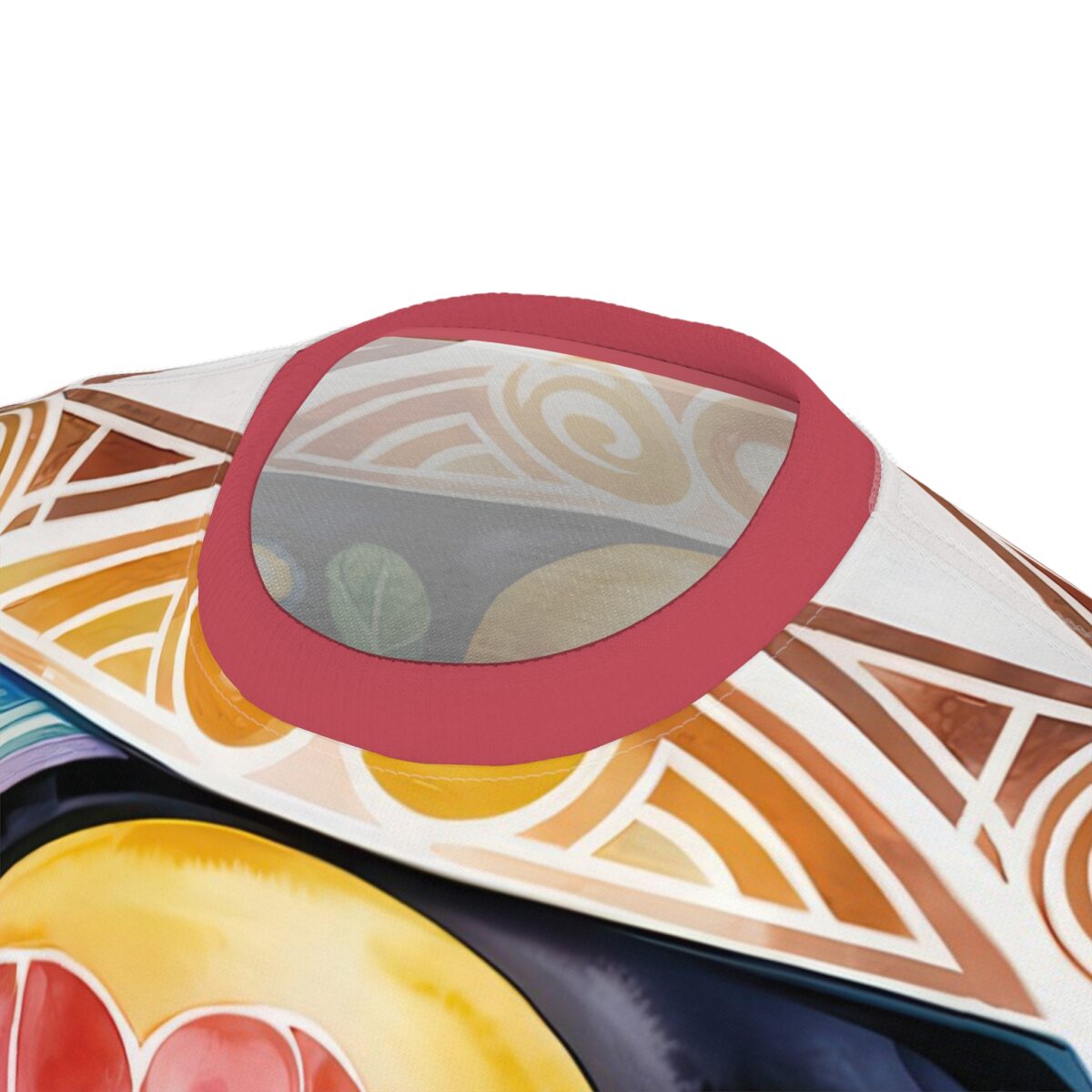 Warm oranges, browns, and yellows in abstract shapes and swirls cover this patterned tee shirt, with hints of green and purple.