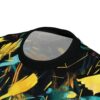 Vibrant yellow, teal, and blue paint splatters cover this graphic streetwear tee, creating a bold abstract design.