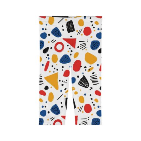 White leggings with a seamless all over print of abstract shapes in red, blue, yellow, black, and white.