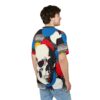 Bold red, blue, and yellow circles, black and white polka dots, and checkerboard patterns cover this graphic streetwear tee, featuring a large, distressed white skull with red accents.