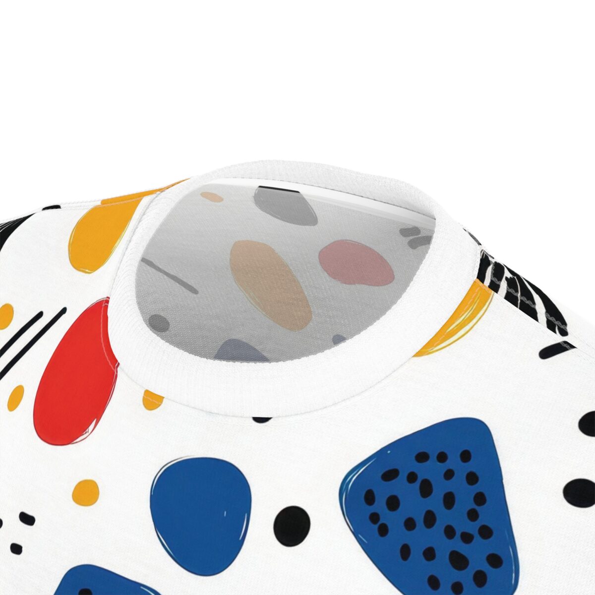 Bold red, yellow, blue, and black abstract shapes and lines cover this 3D graphic t-shirt, with scattered dots and larger organic forms.