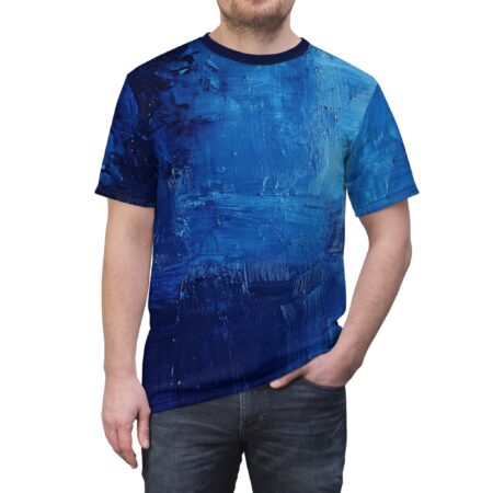 Deep blue, electric blue, and lighter blue brushstrokes cover this all over print apparel, featuring a textured, abstract painting design.