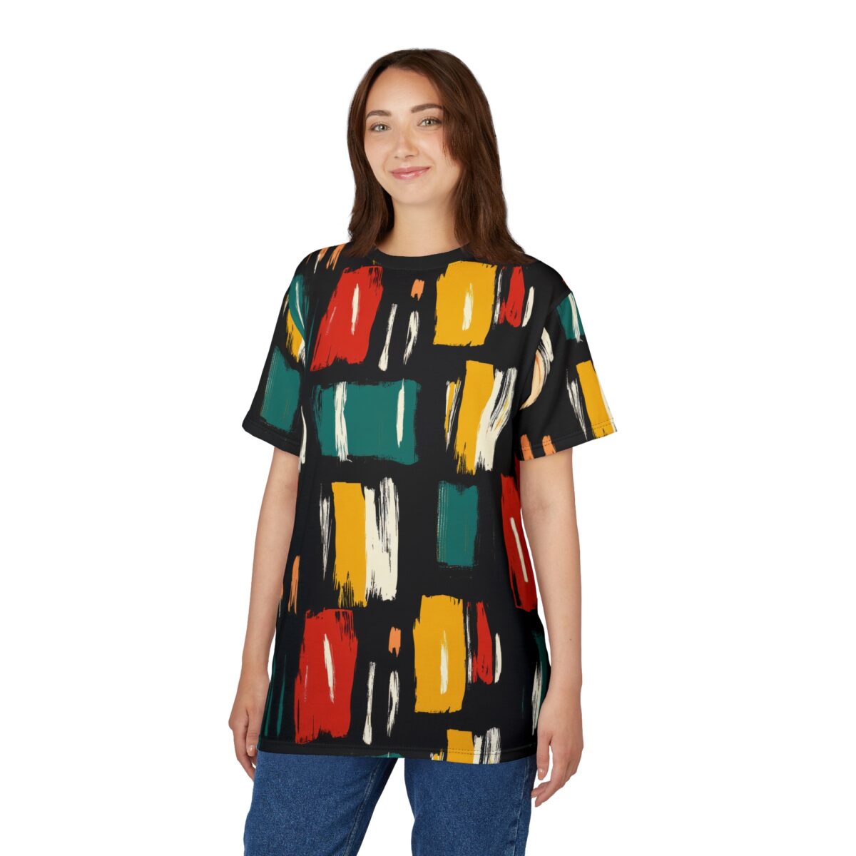 Red, teal, yellow, white, and orange brushstrokes cover this sublimation graphic tee, creating a bold abstract design on a black background.
