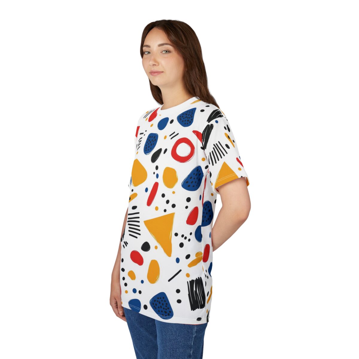 Red, blue, yellow, and black abstract shapes, dots, and lines cover this 3D graphic t-shirt.