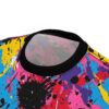 Bright yellow, hot pink, electric blue, and deep purple paint splatters cover this full print shirt, with black ink splashes and white accents.
