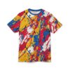 Yellow, red, blue, and white paint splatters with black accents cover this 3D graphic t-shirt, creating a chaotic and artistic design.