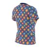 Blue sublimation tee with all over print of geometric tiles featuring white flowers in red, orange, green, and blue.