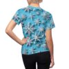 Blue sublimation tee with white all over print snowflakes, seamless wrap around winter graphic.
